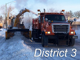 Removing snow in Aitkin