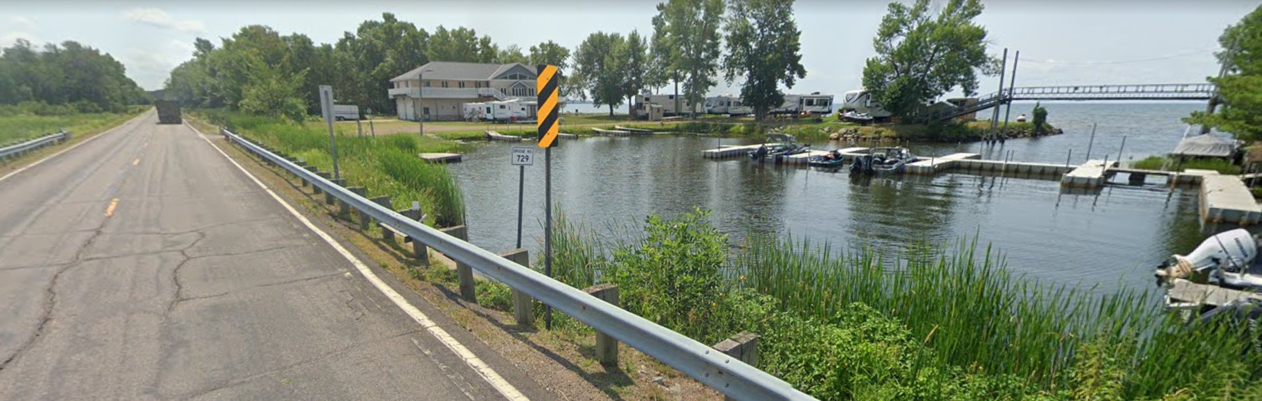Screen shot of current bridge photo in google Screen shot of current bridge photo in google shows bay and Hwy 18.