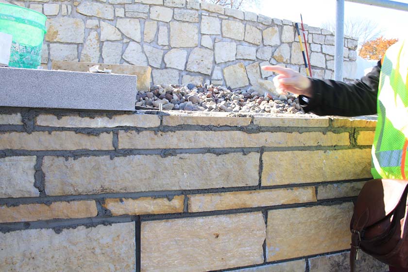 During upper and veneer walls